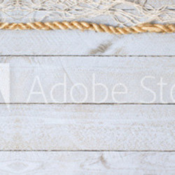 Lifebuoy on empty horizontal wooden background texture - copy space for individual text