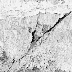Wall fragment with scratches and cracks