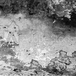 Wall fragment with scratches and cracks