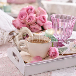 romantic coffee served to bed with bunch of roses