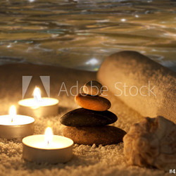 spa stones in night with water concept