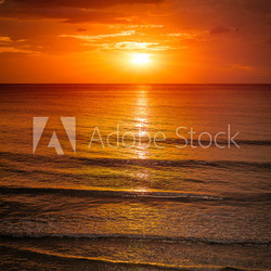 Sunrise in the sea with softwave and cloudy