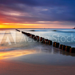 Baltic sea at beautiful sunrise in Poland beach.