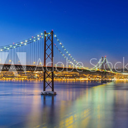 Night view of Lisbon and of the 25 de Abril Bridge, Portugal