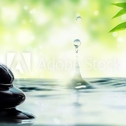 Pebbles, bamboo and drop of water.