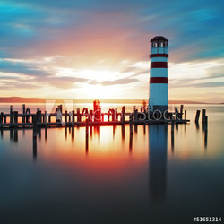 Ocean lighthouse sunset