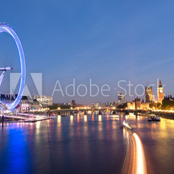 London Eye And Big Ben On The Banks Of Thames River At Twilight