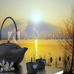 Teapot and cups on table