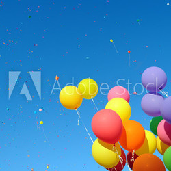 multicolored balloons and confetti