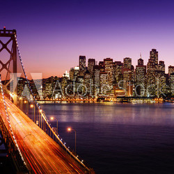 San Francisco skyline and Bay Bridge at sunset, California