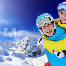 Skiing, winter sports, couple having fun on ski