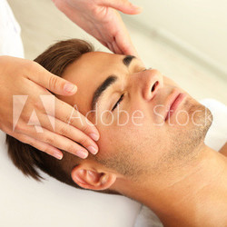 Man having head massage close up