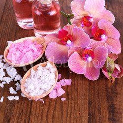 Spa treatments on color wooden background