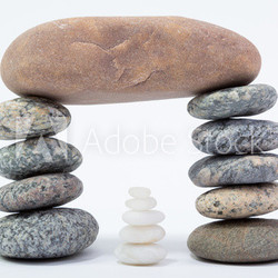 Stones balance - pebbles stack isolated on white