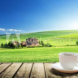 cup coffee and tuscany landscape, Italy