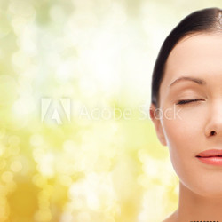 relaxed young woman with closed eyes