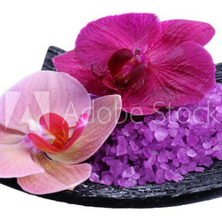 Beautiful blooming orchid flowers  and heap of sea salt