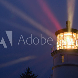 Lighthouse Beams Illumination Into Rain Storm Maritime Nautical