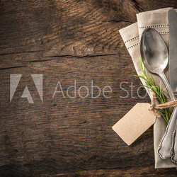 Vintage silverware with an empty tag