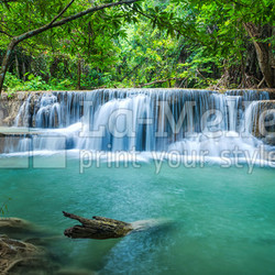 Green landscape with green waterfall at Erawan waterfall