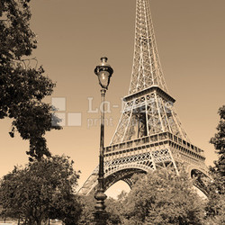 While French elections are making headlines, Eiffel Tower remains popular as ever with tourists, Paris France. Sepia filter