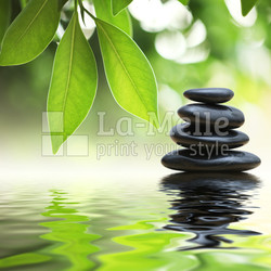 Zen stones pyramid on water surfac