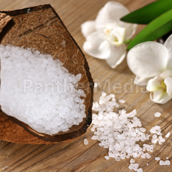 coconut with bath salts and orchid