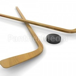 Ice hockey sticks and puck