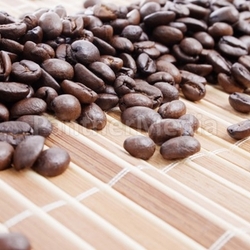 Coffee beans on bamboo placemat