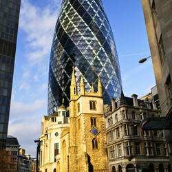 Gherkin building and church of St. Andrew Undershaft in London